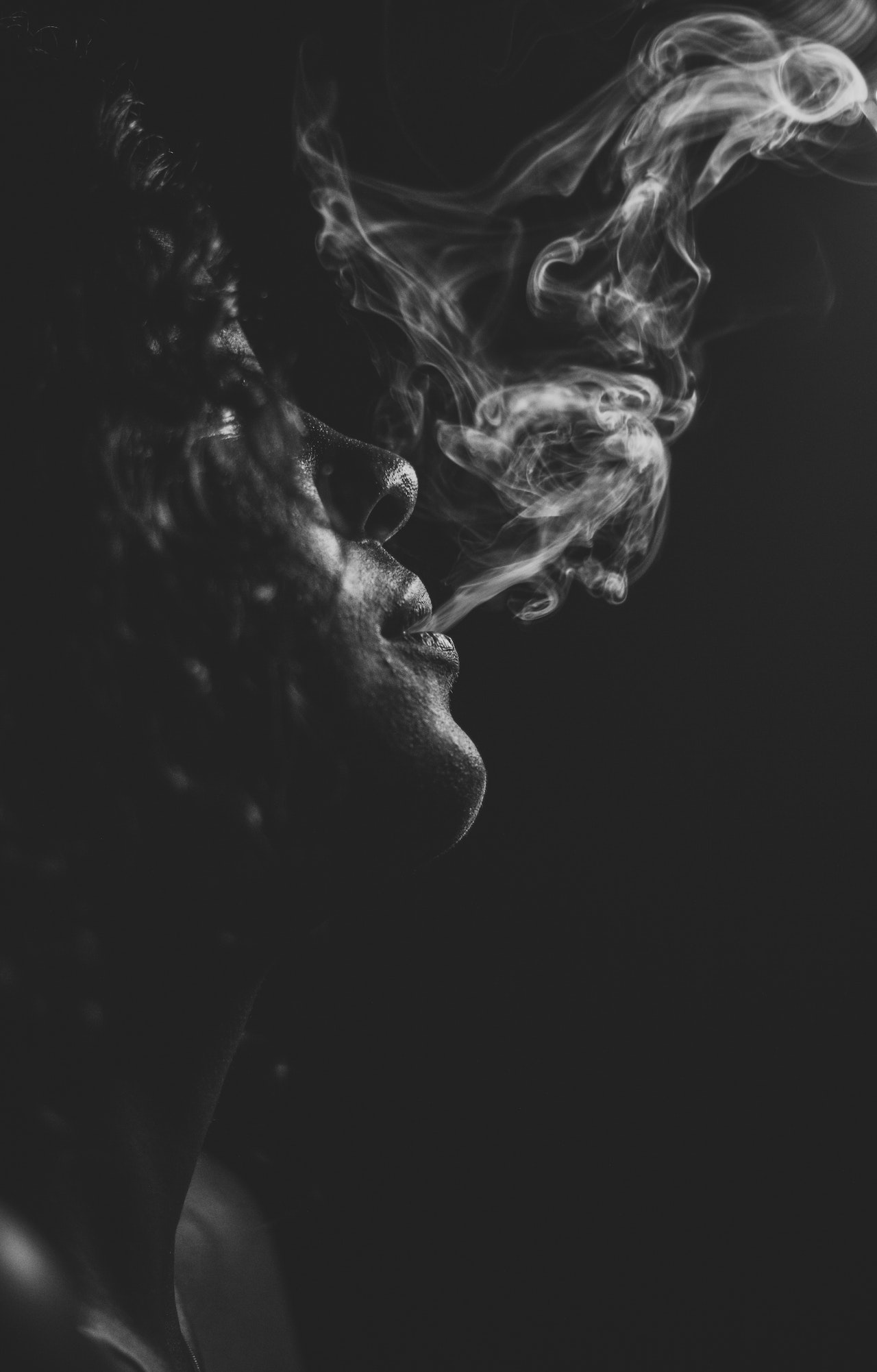 pinoy-woman-smoking-bong-black-home-image
